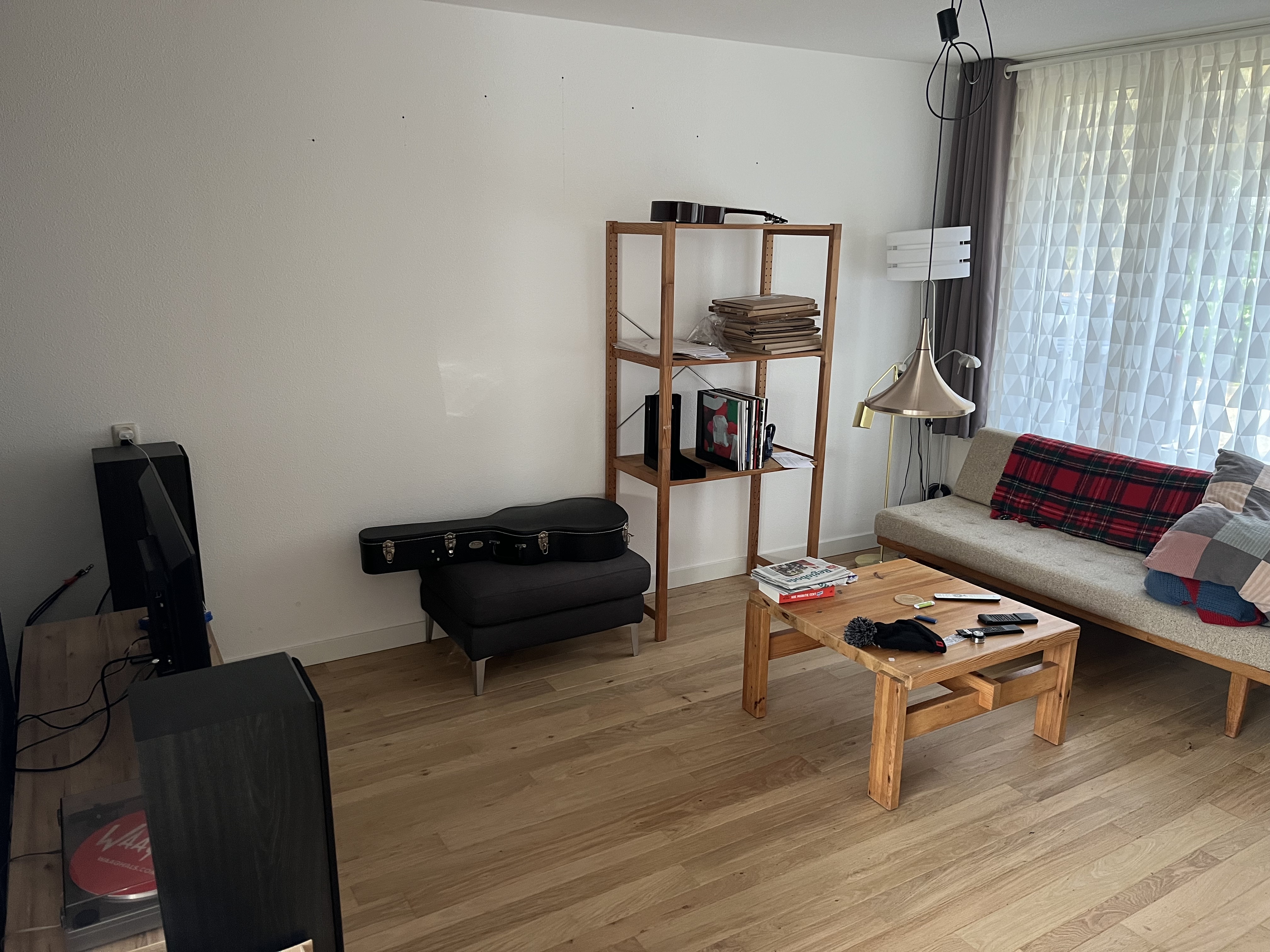 Living room - NS3 would sit against the wall where the acoustic guitar &amp; the shelving unit sits