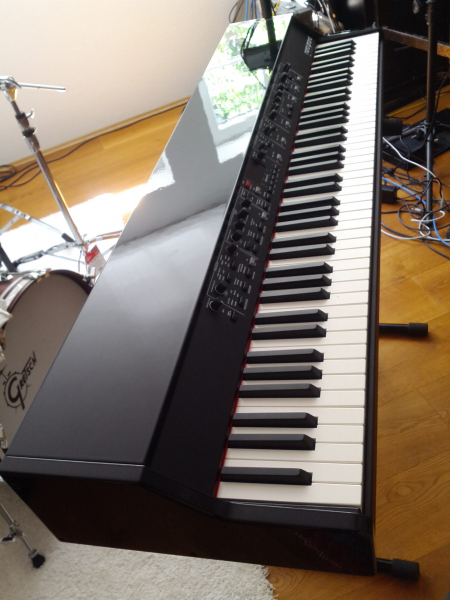 my nord grand in a black polished grand piano finish